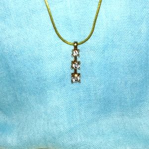 3-8-43 three stones on goldtone necklace good condition